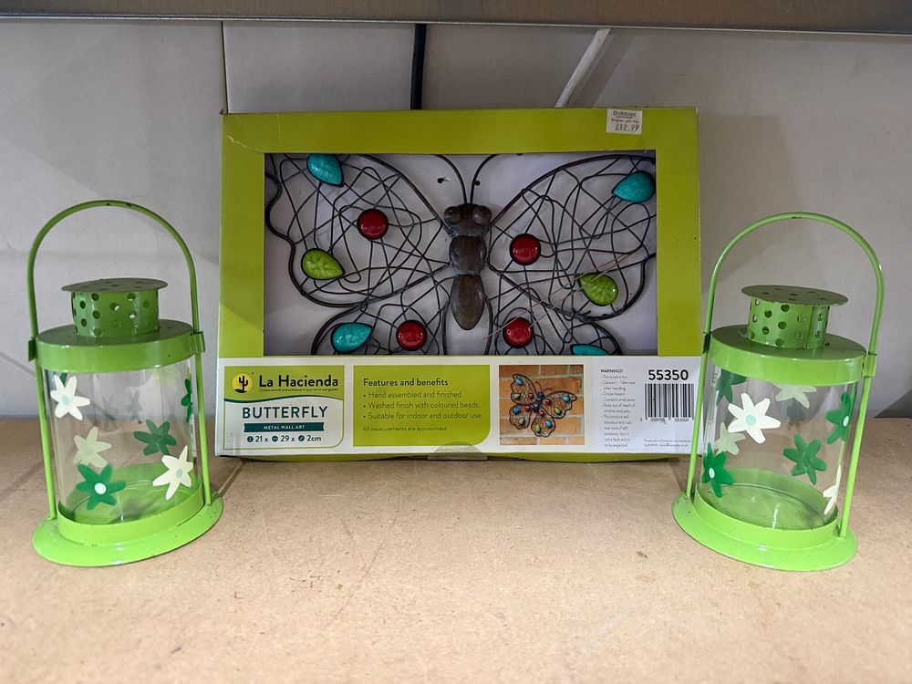 Lot 177: La Hacienda metal butterfly wall art and two garden lanterns