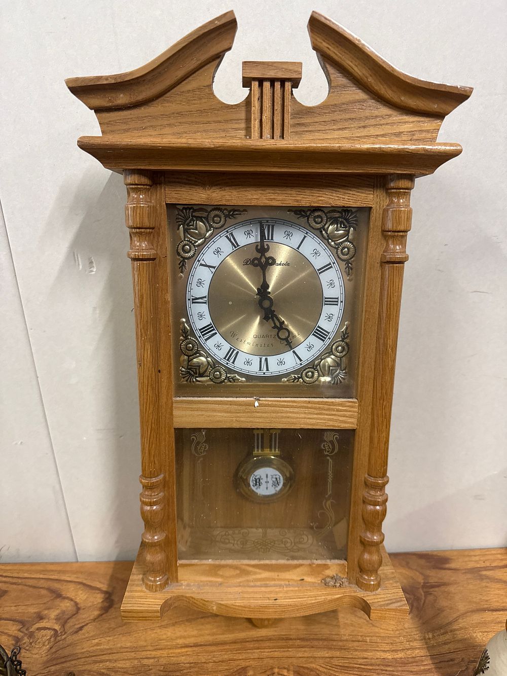 Lot 201: Daniel Dakota Oak-Finish Westminster Chime Quartz Wall Clock