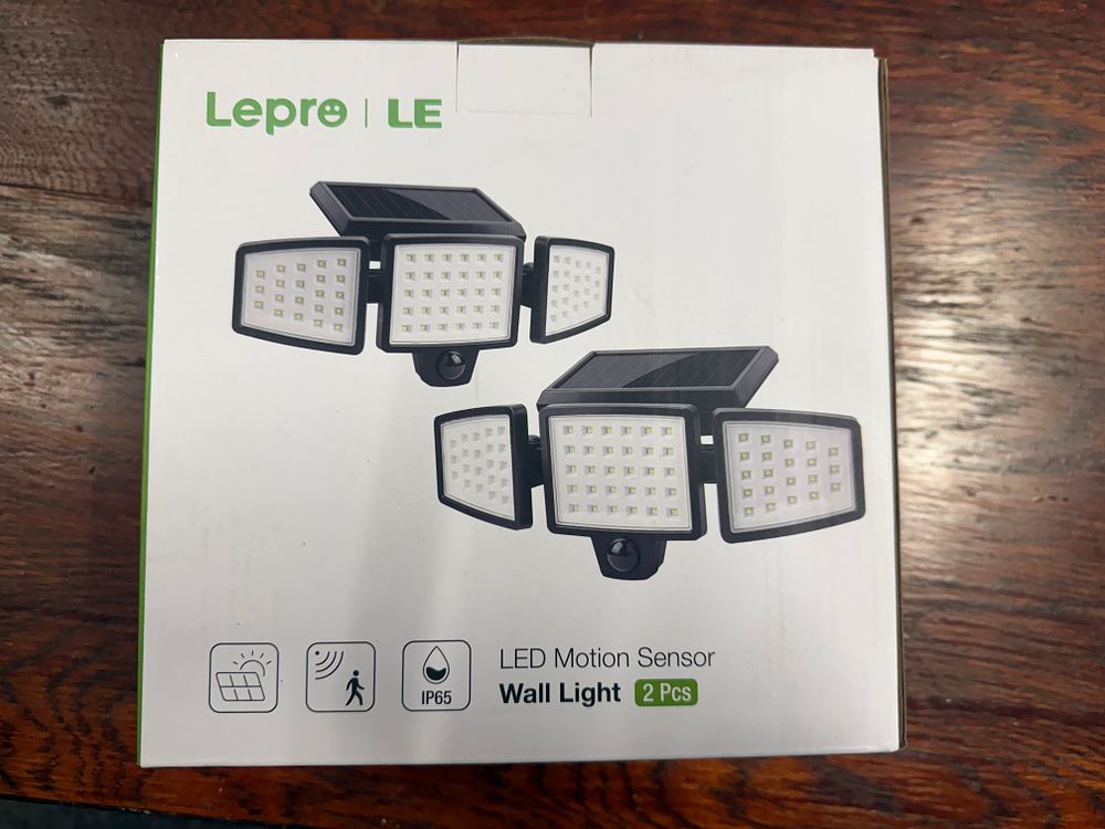 Lot 206: A pair of Lepro solar-powered motion sensor LED security lights