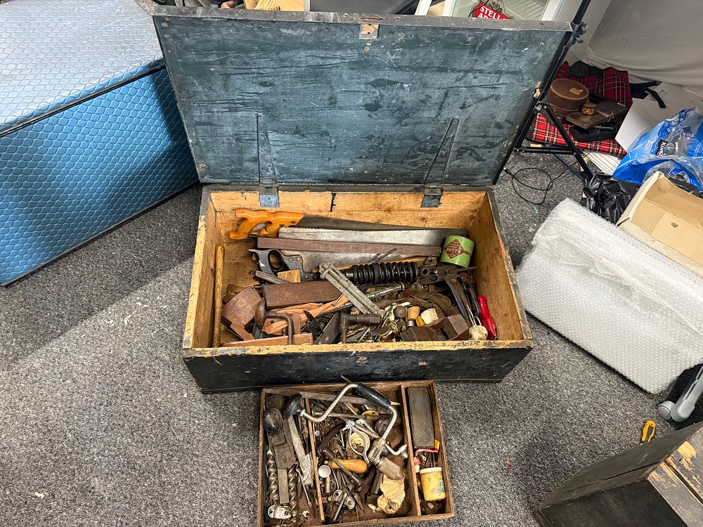 Lot 215: A large Victorian carpenter's tool chest with assorted hand tools