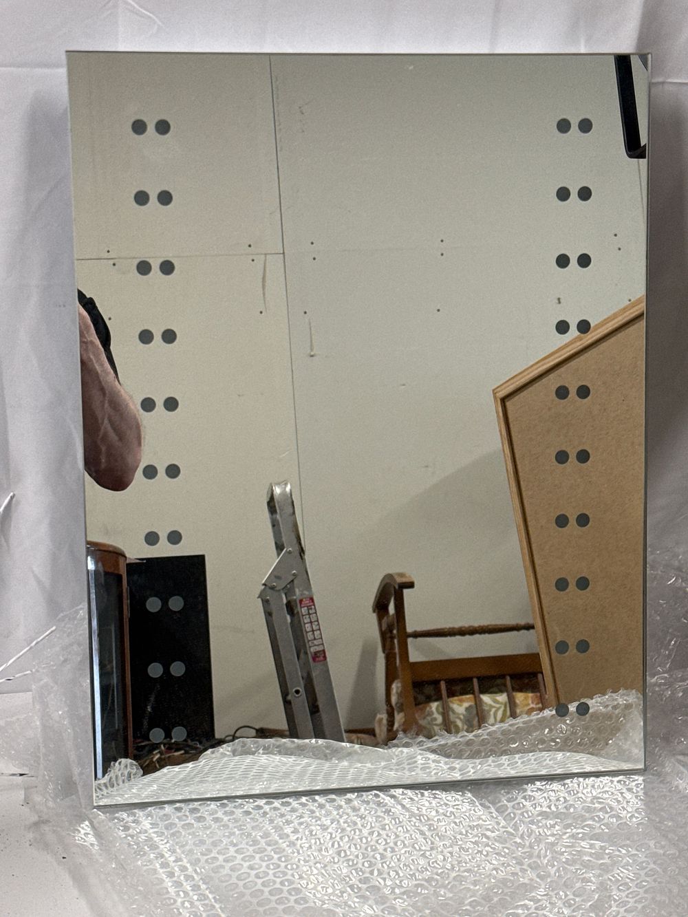 Lot 217: A contemporary Saxby Lighting Toba illuminated mirror