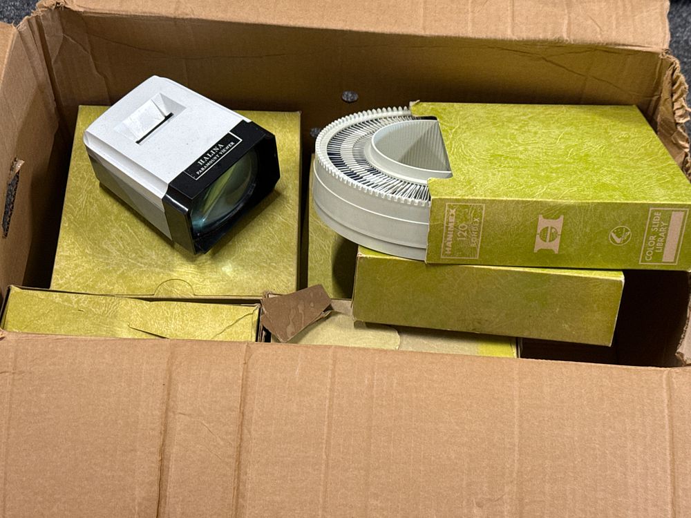 Lot 219: A collection of Hanimex Rondex slide trays and Halina Paramount viewer