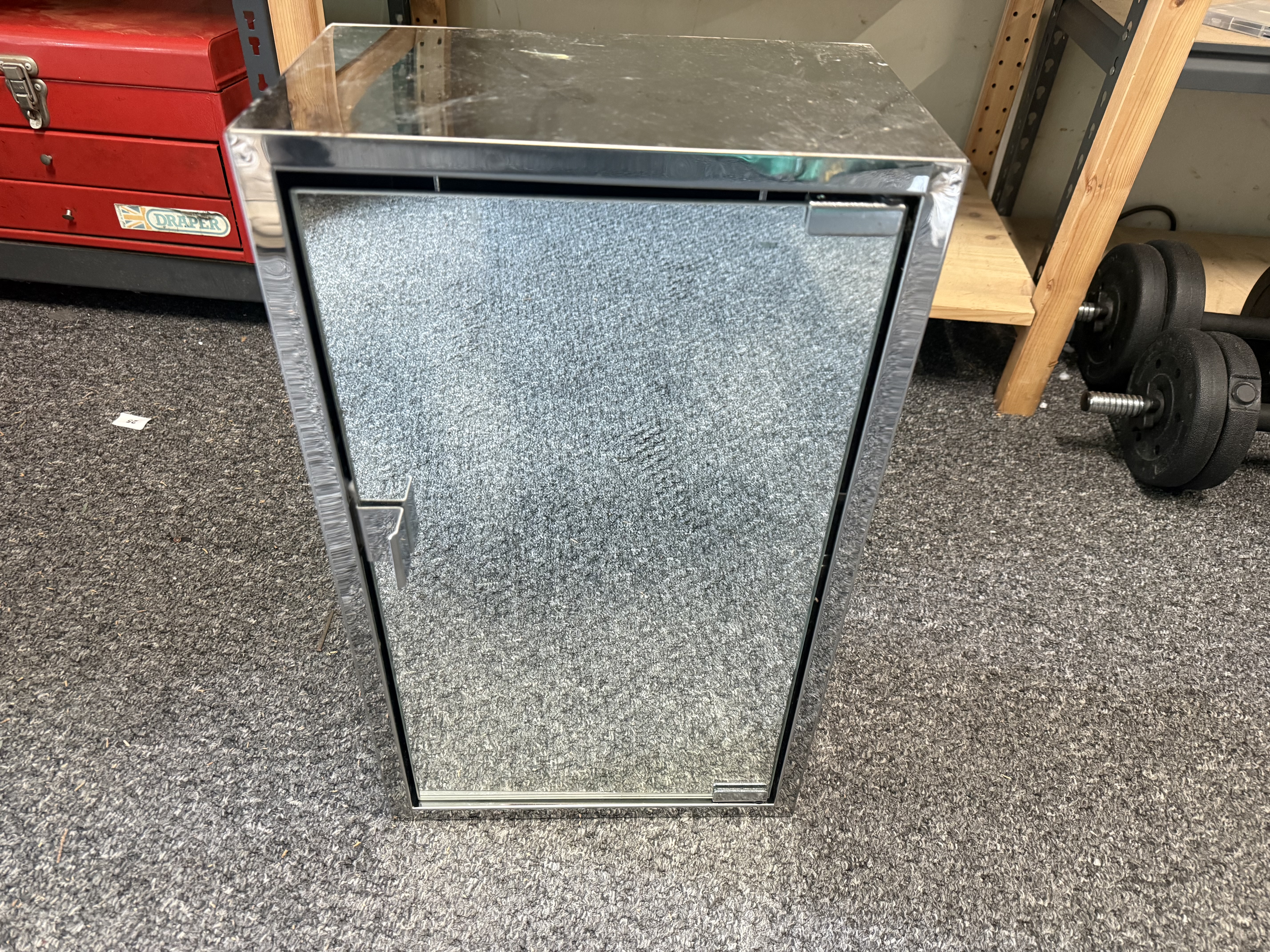 Polished metal wall-mounted mirrored bathroom or utility cabinet