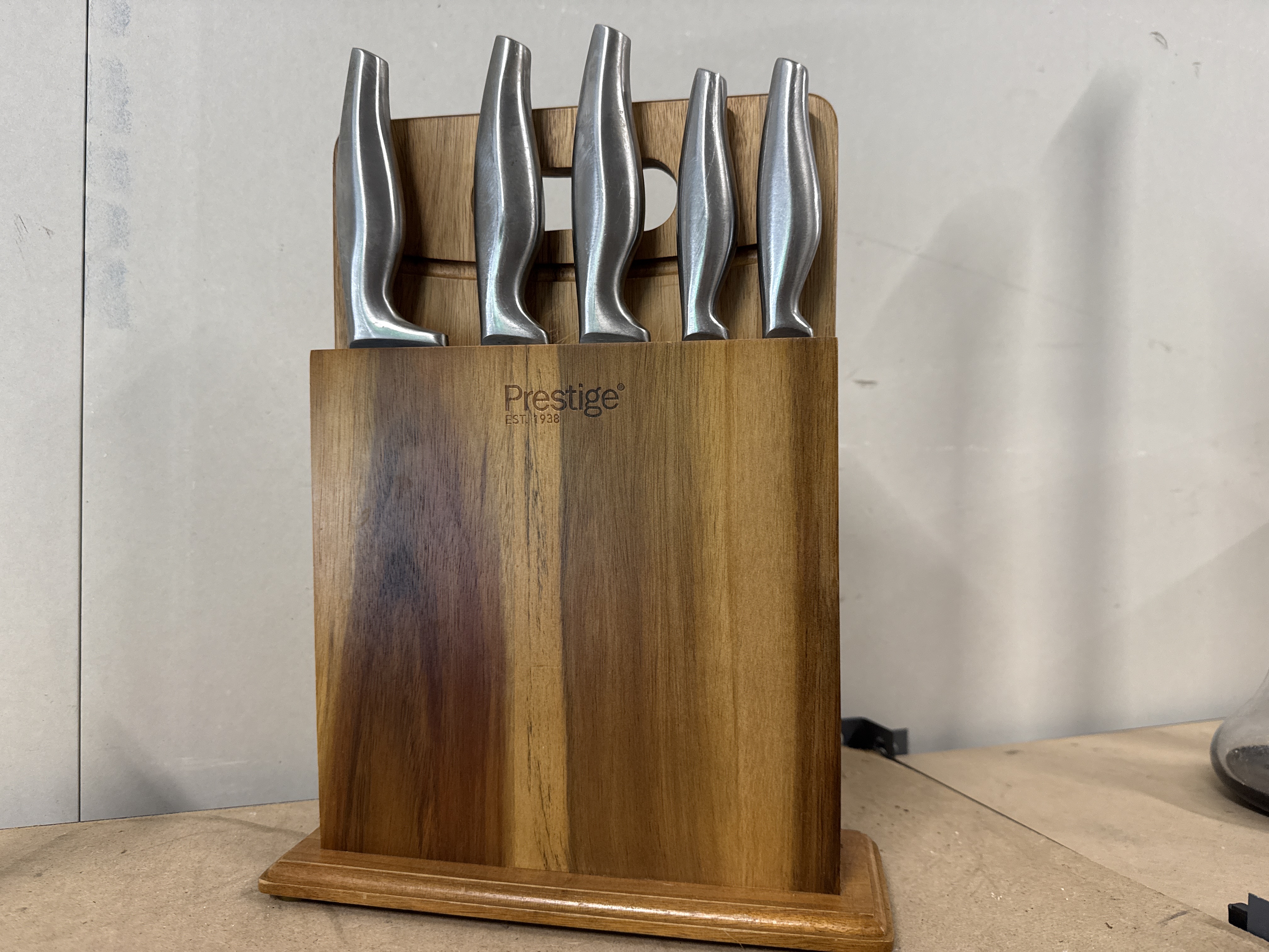 A Prestige stainless steel knife set with integrated cutting board