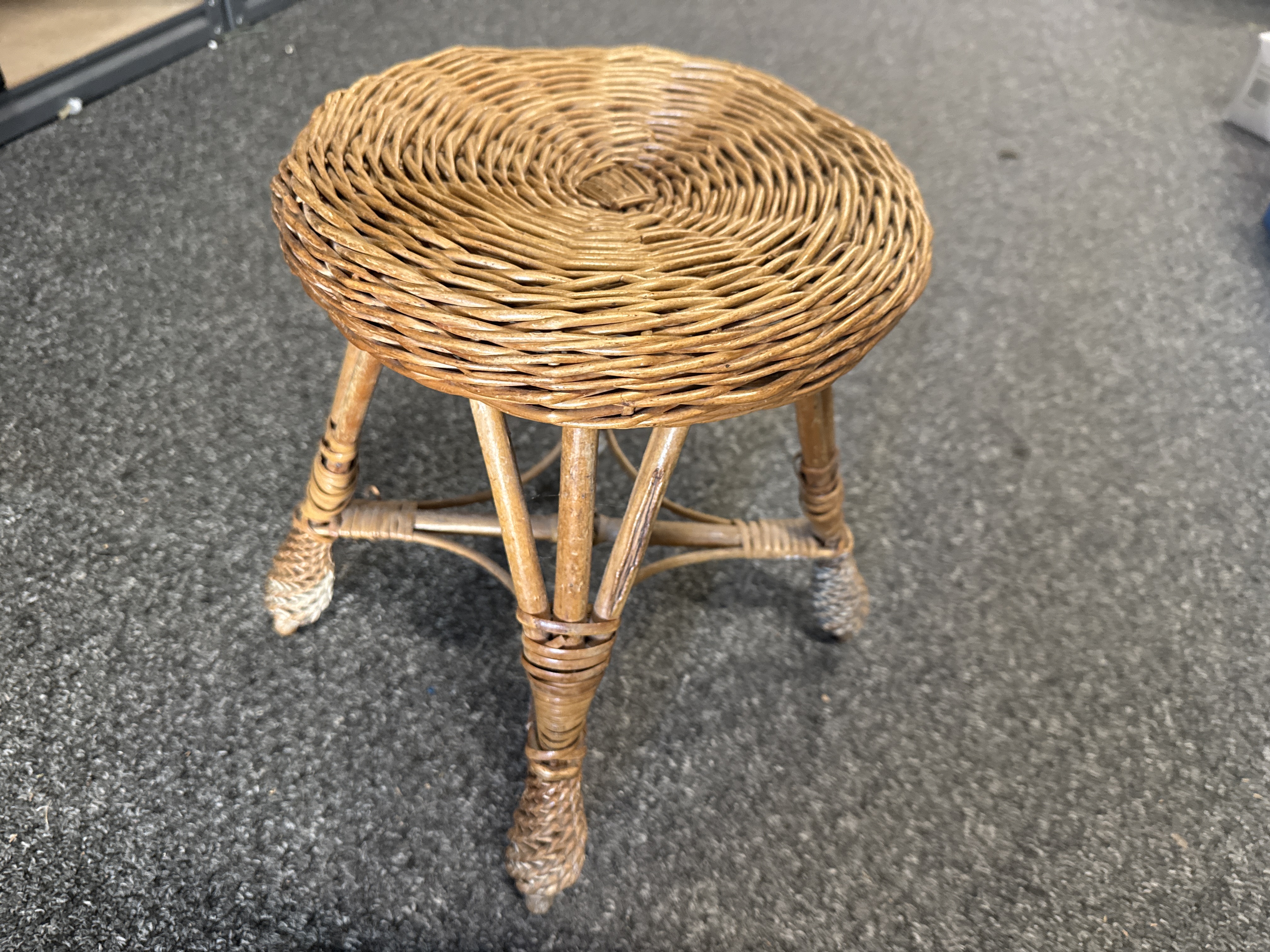 Vintage wicker and rattan tripod stool with spiral woven seat