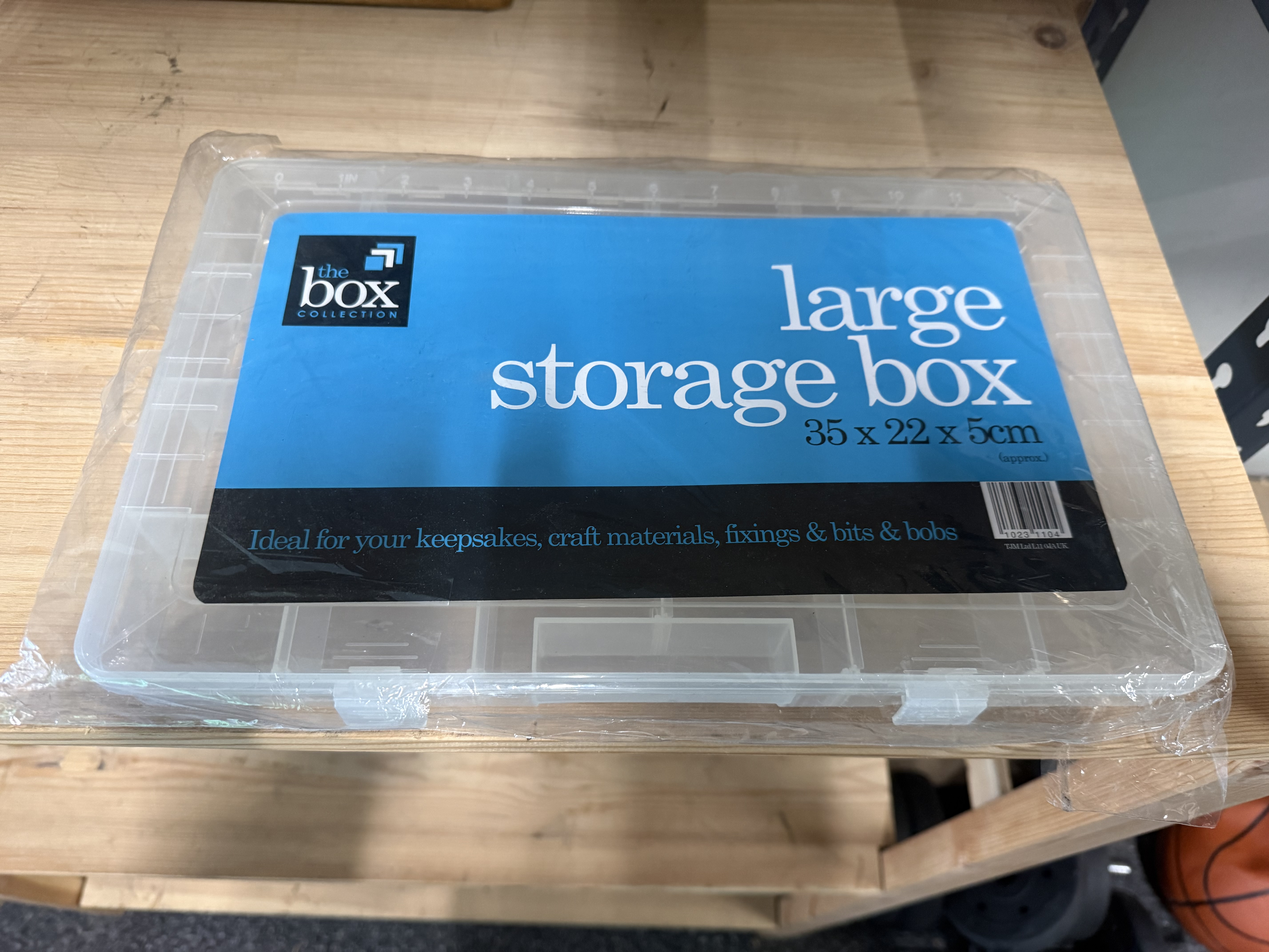 A clear plastic large storage box by The Box Collection