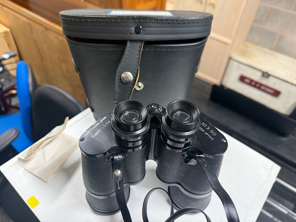 Lot 7: Mark Scheffel Optics 10x50 Super-Lite binoculars with case