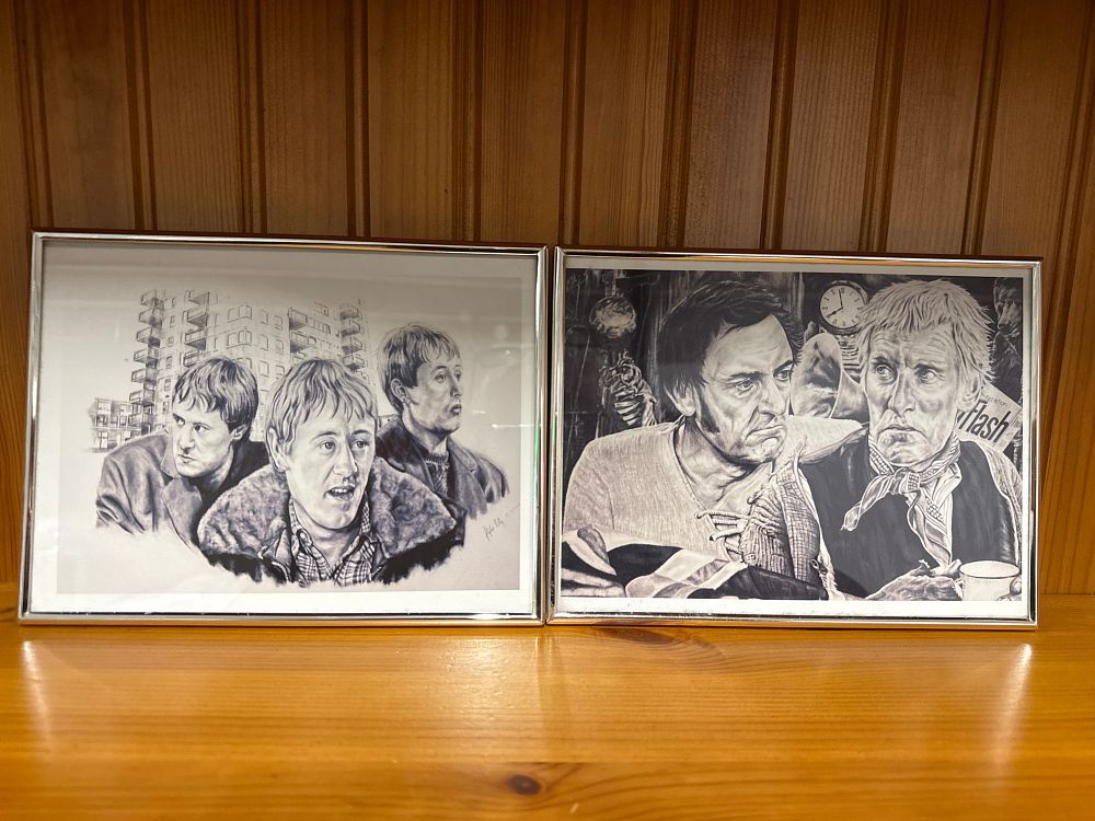 Lot 8: A pair of framed British television character drawings by Stephen Lilly