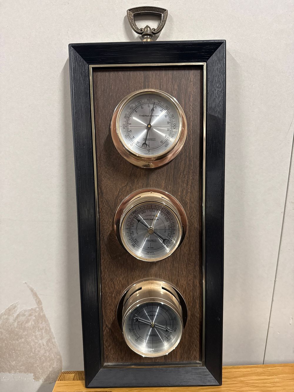 Lot 11: A Springfield three-instrument weather station in black frame