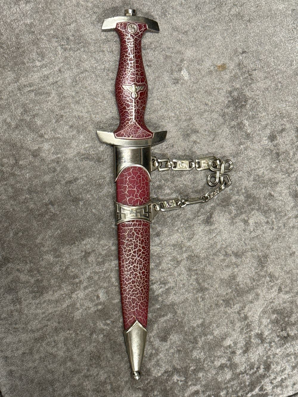 Lot 110: A decorative reproduction Third Reich chained SS dress dagger