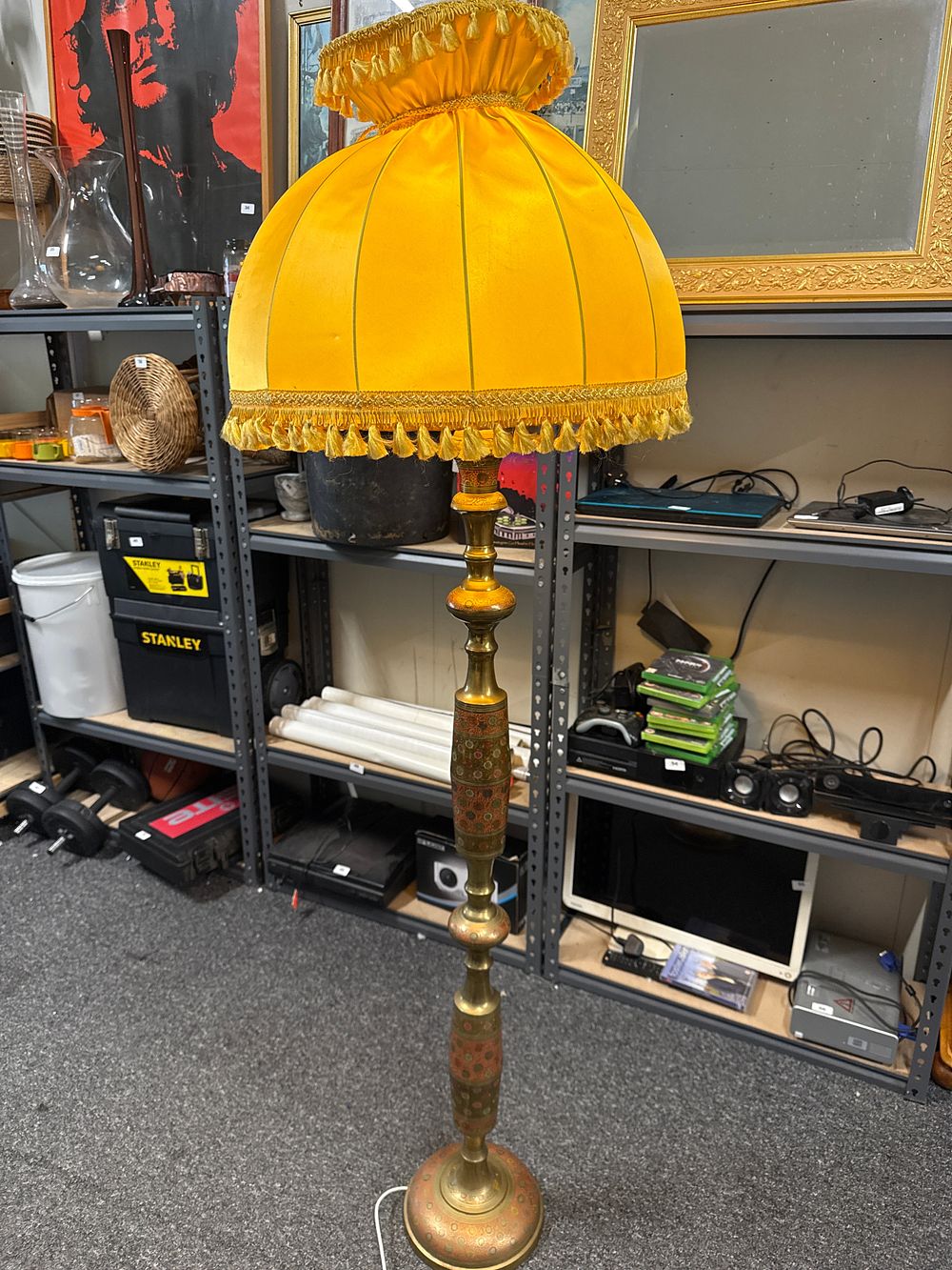 Lot 118: A mid-century engraved polychrome enamelled brass standard floor lamp