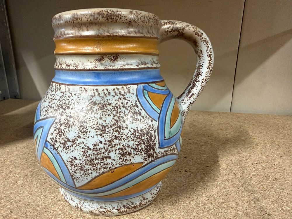 Lot 34: A Wadeheath Ware hand-painted and sponged earthenware pitcher