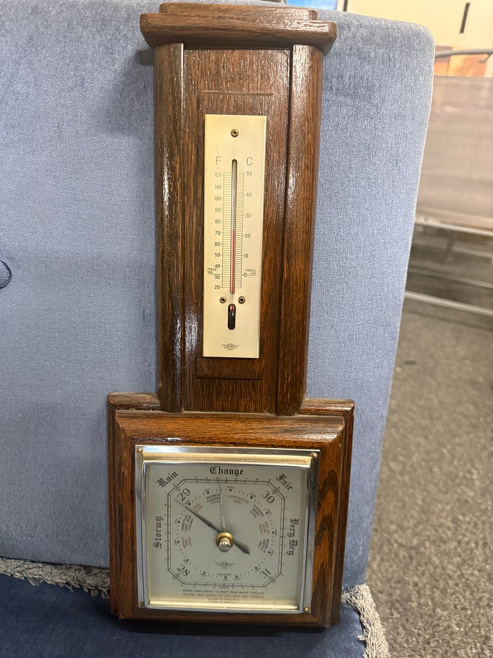 Lot 36: Mid-century English dark oak barometer and thermometer station