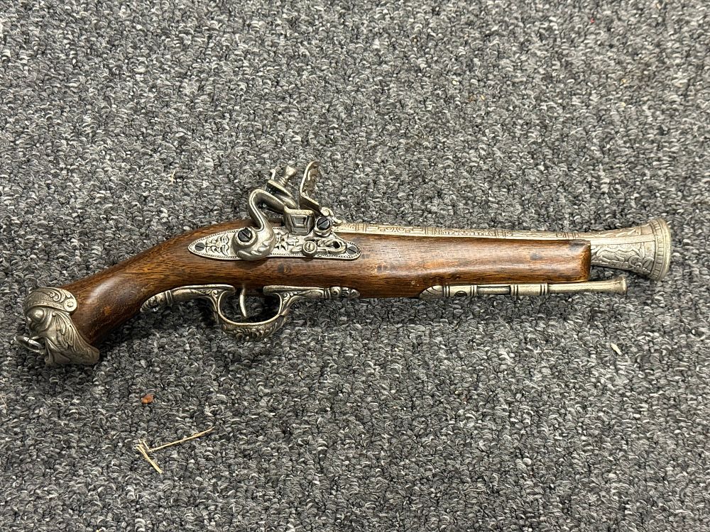 Lot 74: Decorative replica flintlock blunderbuss pistol with Assassin's Creed logo