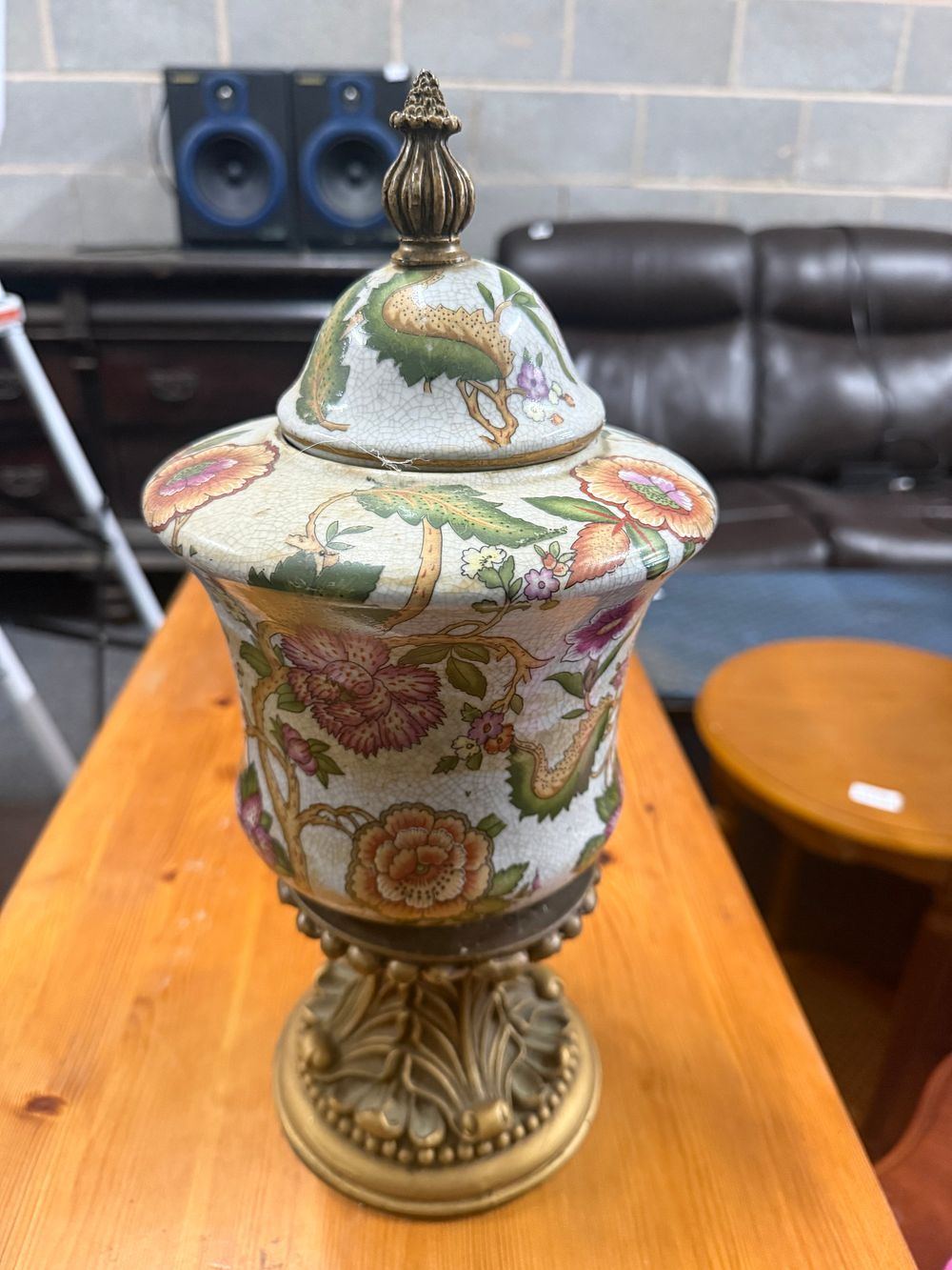 Lot 41: A decorative polychrome ceramic lidded jar with ornate metal mounts