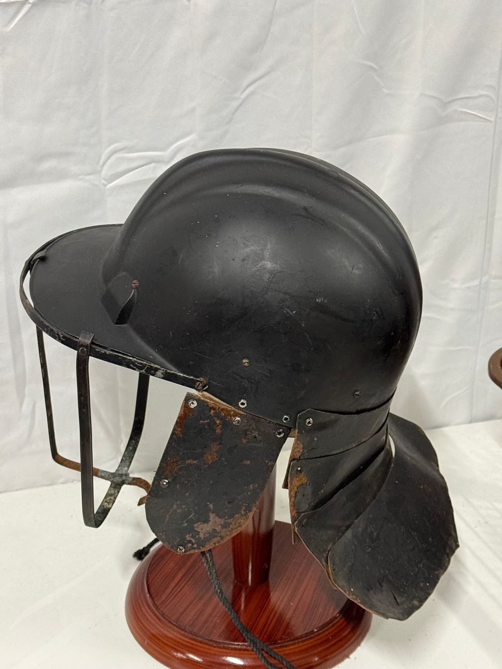 Lot 2: A modified French M15 Adrian helmet with protective cage visor