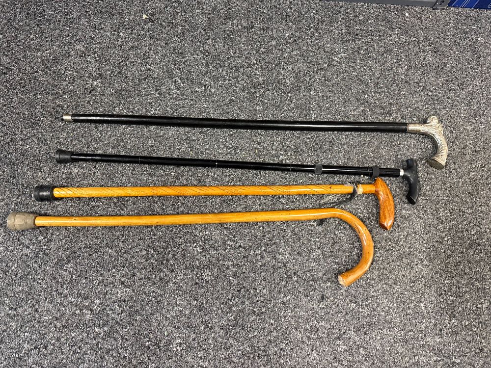 Lot 92: An assortment of vintage and modern walking sticks
