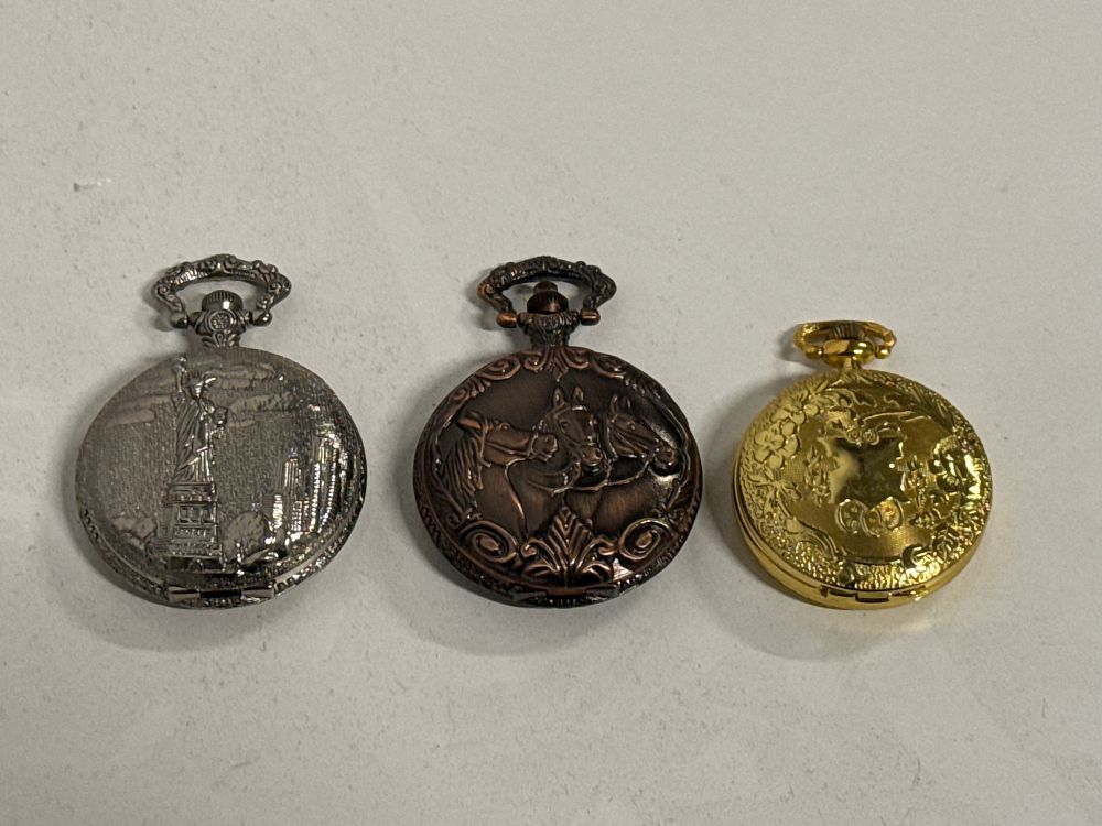Lot 100: Three Decorative Hunter Cased Quartz Pocket Watches