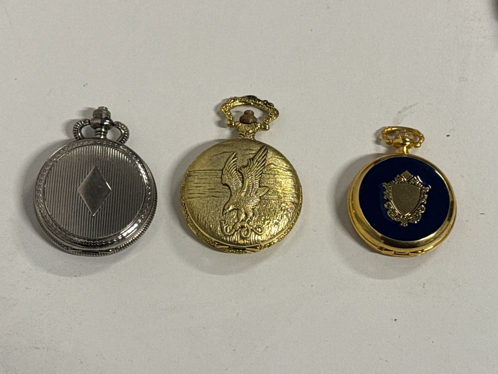 Lot 104: A trio of assorted silver and gold-tone dress pocket watches