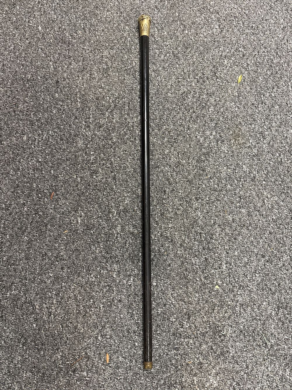 Lot 137: A British Royal Artillery military swagger stick with brass pommel