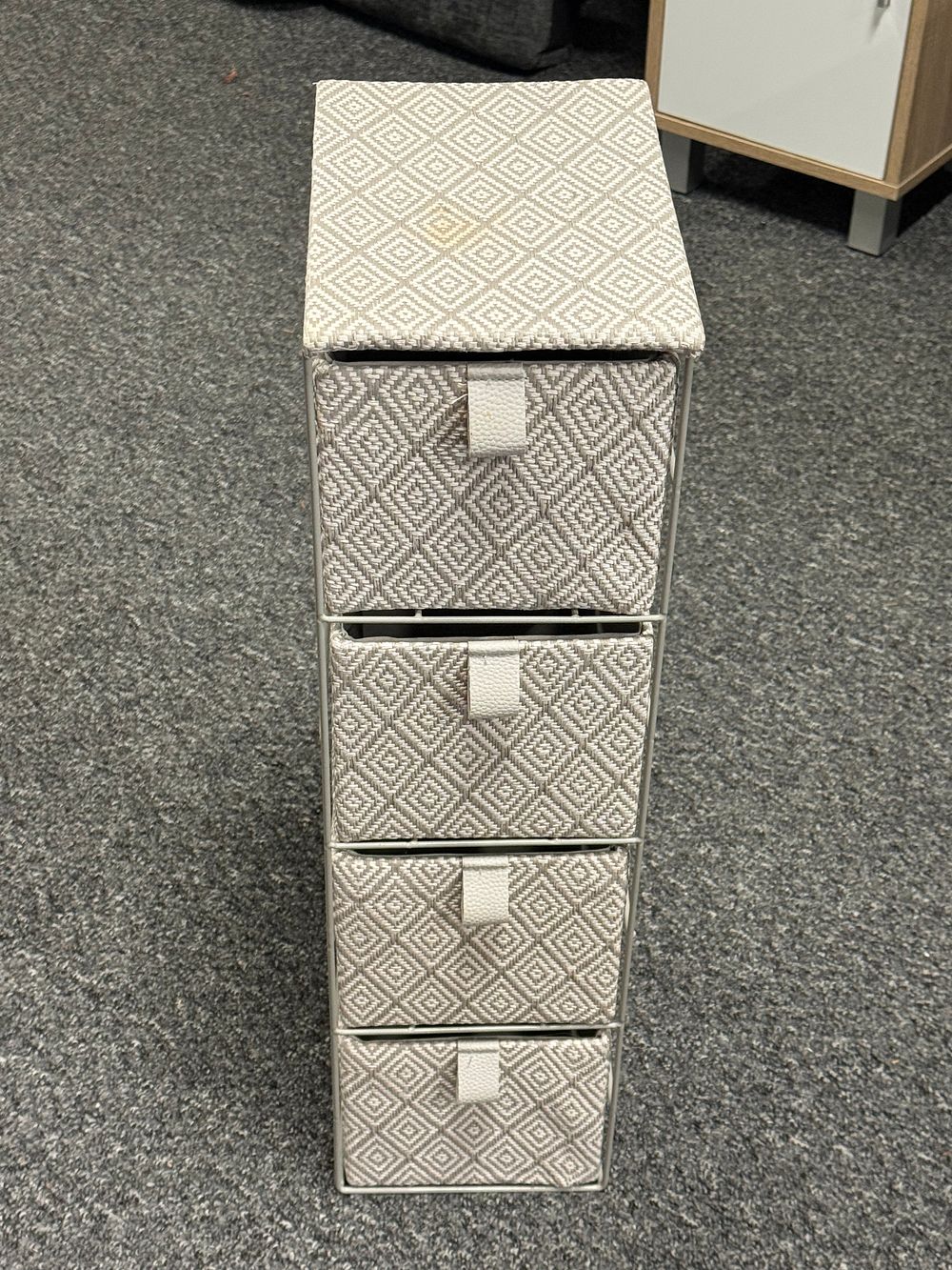 Lot 132: Contemporary five drawer fabric chest with white metal frame