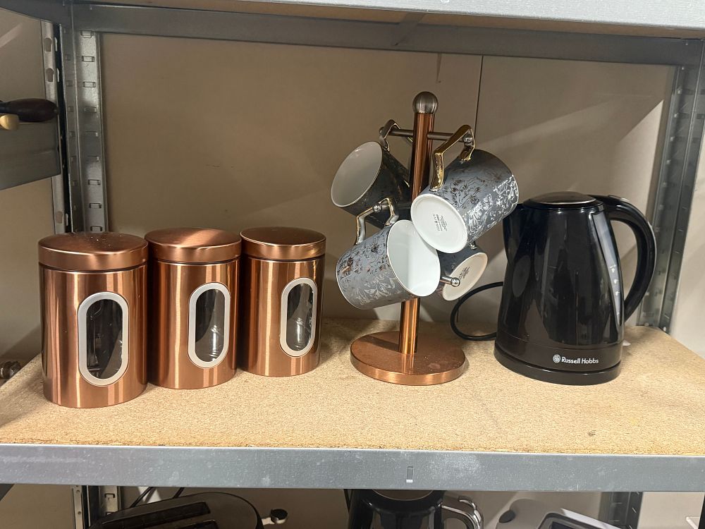Lot 162: A collection of copper kitchenware and a Russell Hobbs kettle