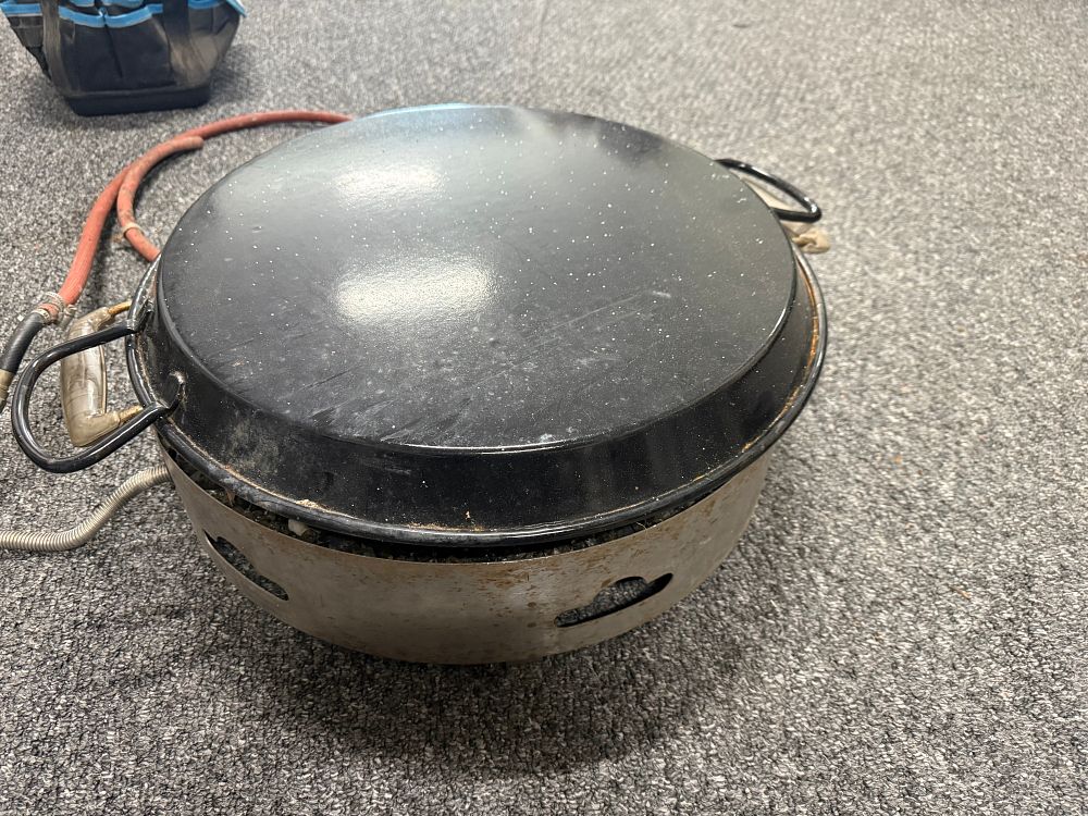 Lot 185: A Campfire portable outdoor gas fire pit and cooker set