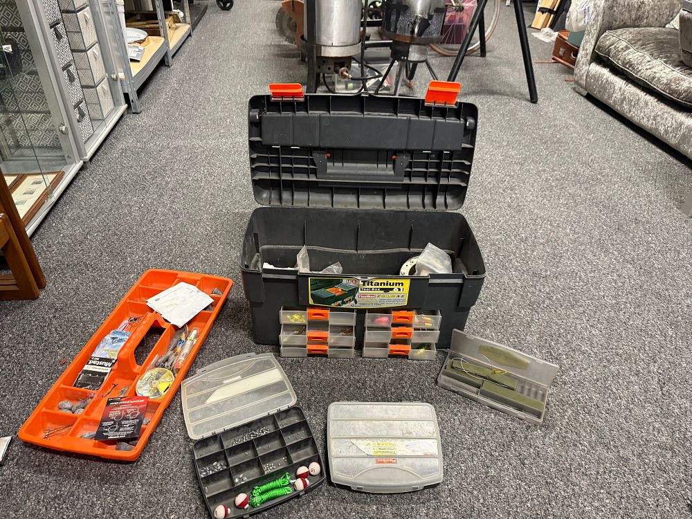 Lot 197: An assortment of fishing tackle in a Plastiken Titanium 61 box