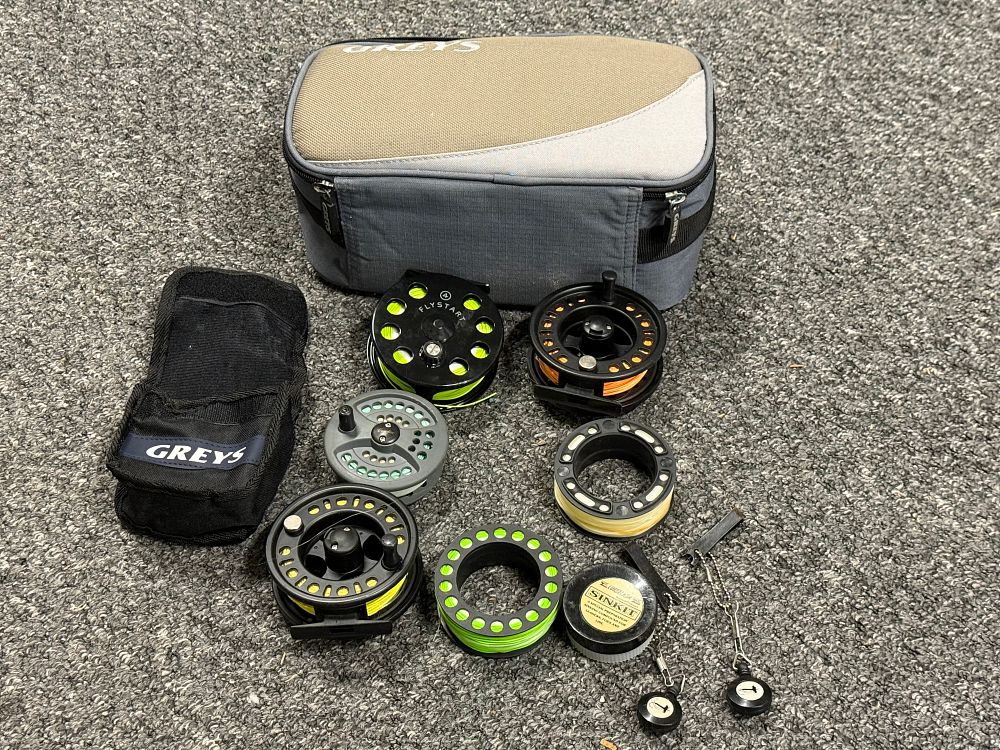 Lot 210: A Greys cased collection of fly fishing reels and spools