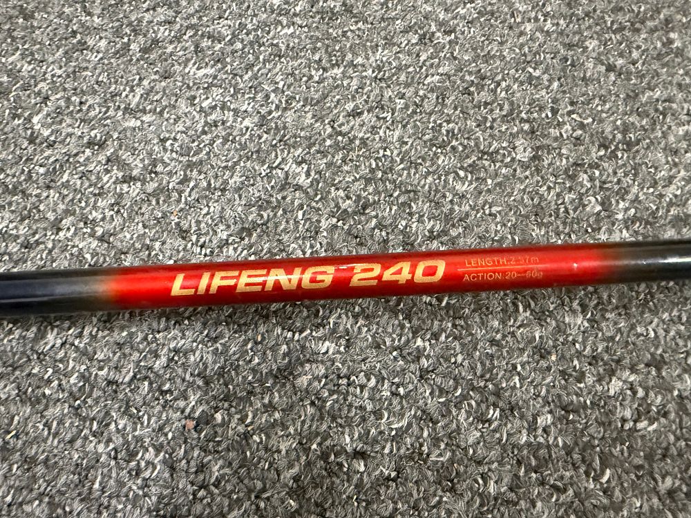 Lot 216: A Lifeng 240 two-piece spinning fishing rod with sleeve