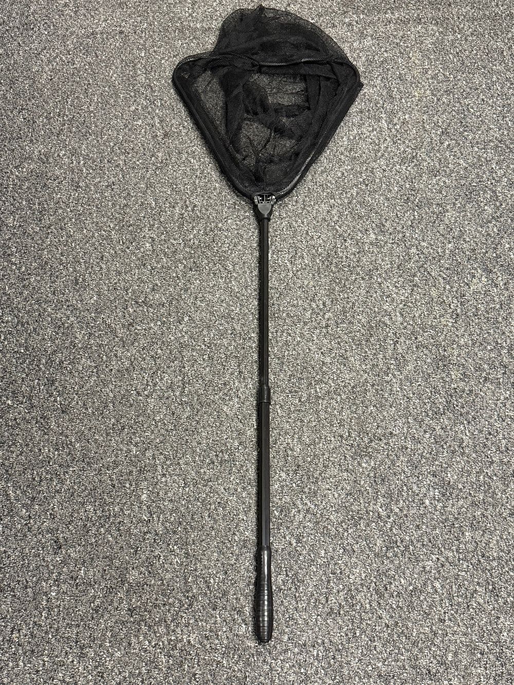 Lot 229: A black telescopic folding landing net with fine synthetic mesh