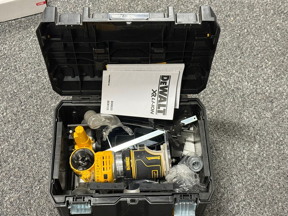 Lot 246: A Working DeWalt DCW604NT 18V XR Brushless Cordless Router Kit. Tested Working With a Dewalt Battery ( not included)