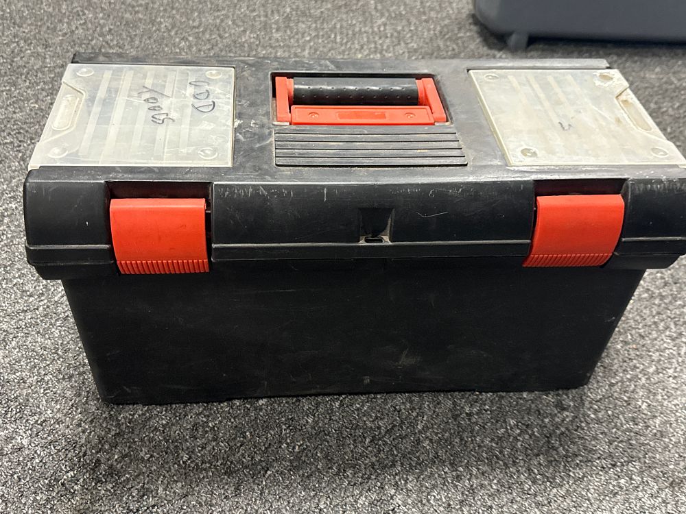 Lot 249: A black plastic toolbox containing an assortment of hand tools