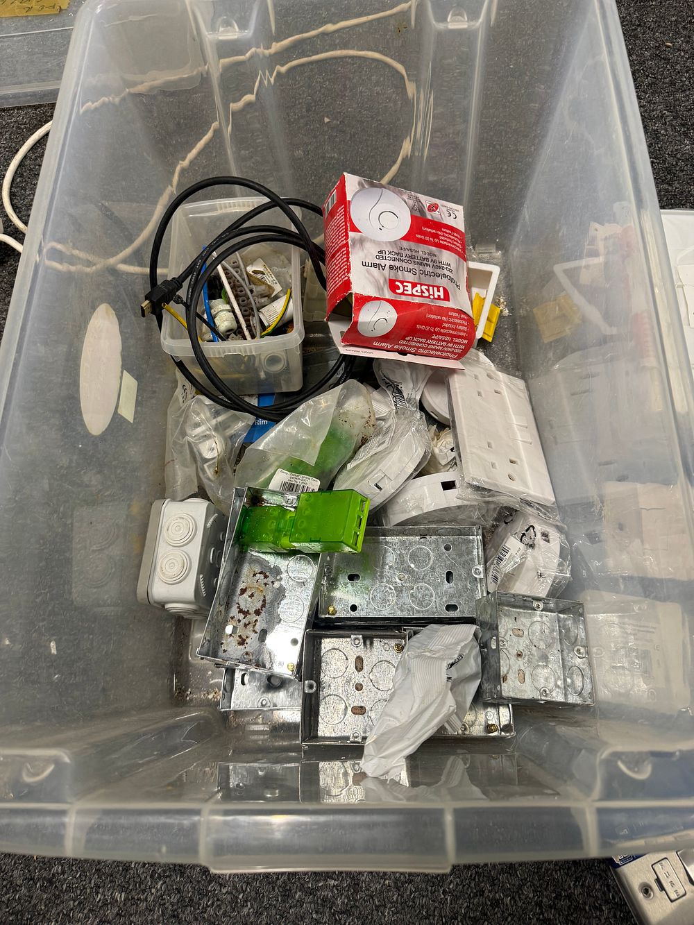 Lot 262: A collection of UK domestic and industrial electrical fixtures and components