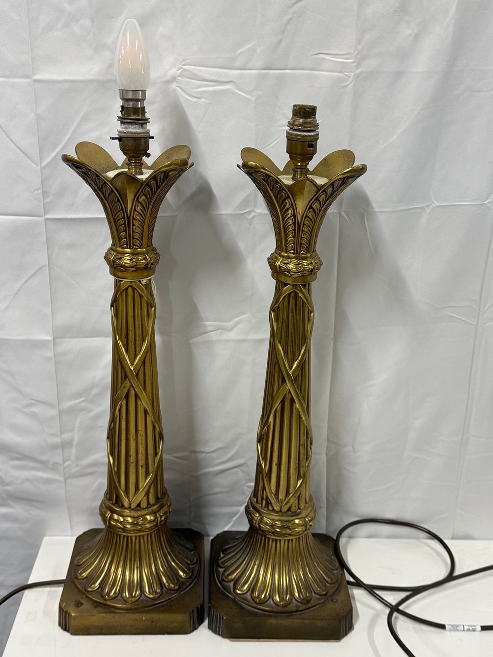Lot 270: A pair of Neoclassical style Brass table lamps each weighing 3kg approx