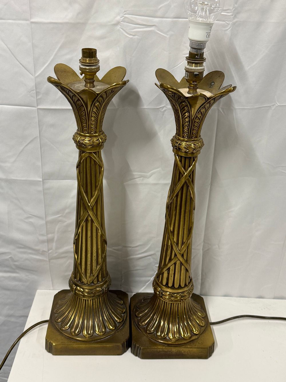 Lot 272: A pair of Neoclassical style Brass table lamps each weighing 3kg approx