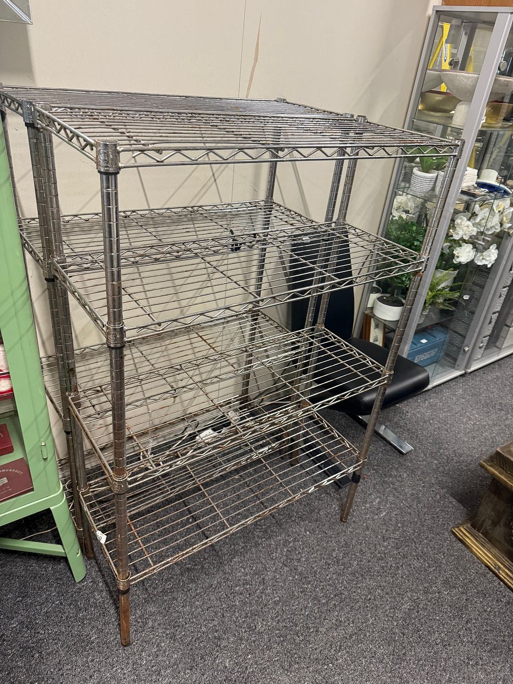 Lot 283: A pair of four-tier industrial chrome-plated steel wire shelving unit. 54 high 36 wide 14 deep inches