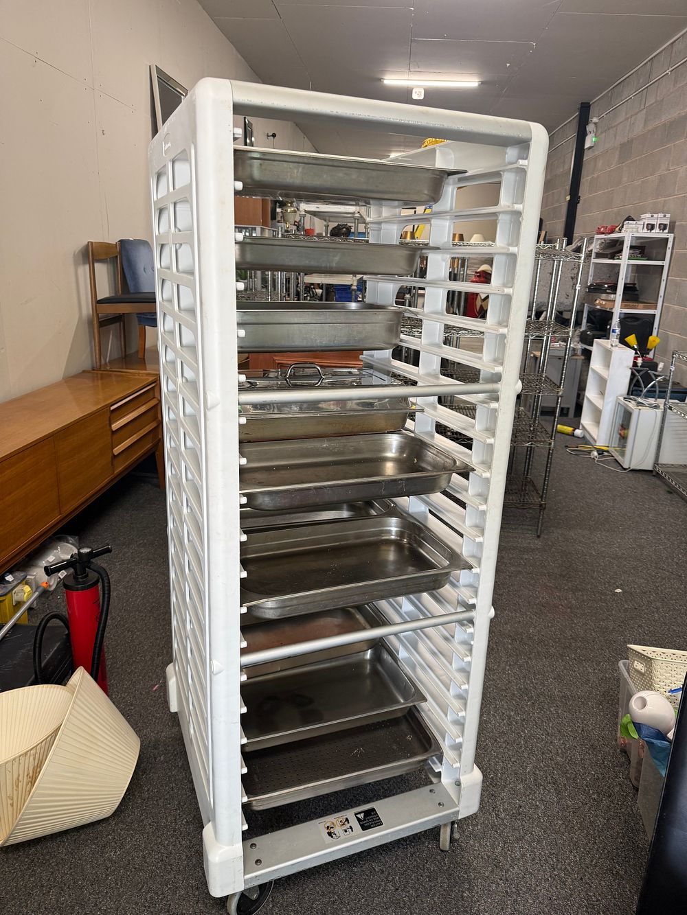 Lot 296: Rubbermaid mobile gastronorm pan rack with stainless steel pans