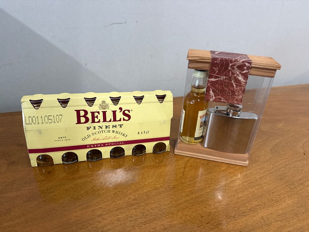 Lot 59a: 6 bottle Bells Whisky Miniature Set and a Famous Grouse