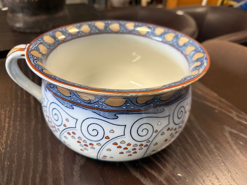 Lot 308: A Royal Doulton Seymour pattern flow blue ceramic chamber pot or an alternative title is a posh piss post