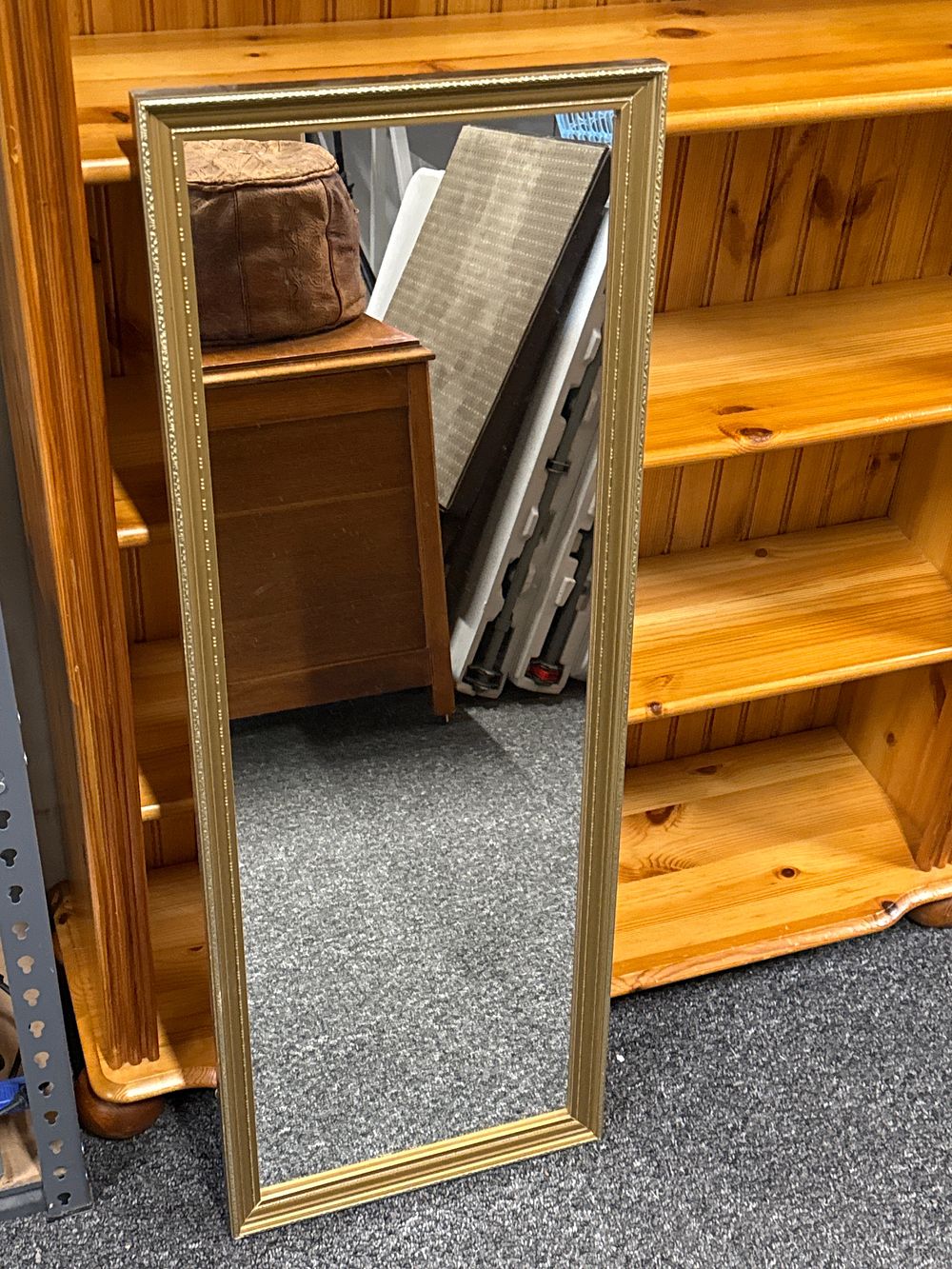 Lot 102: A full-length rectangular wall mirror with a gilt beaded frame