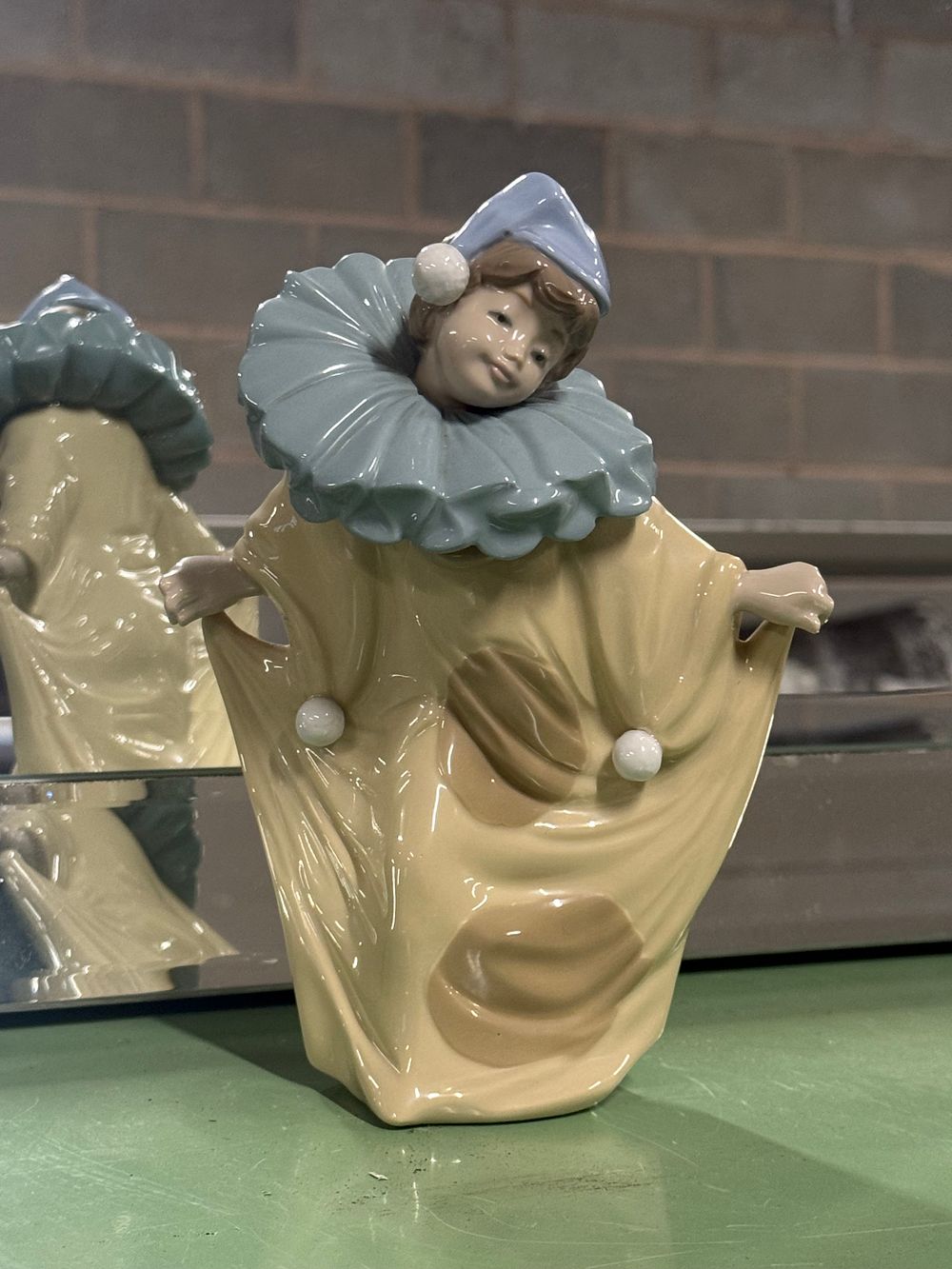 Lot 10: A NAO by Lladro Circus Charmer porcelain clown figurine