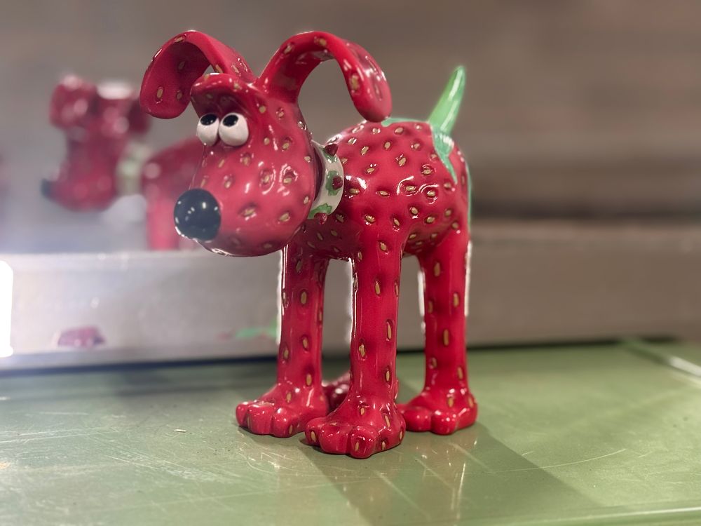 Lot 16: A Gromit Unleashed Gromberry ceramic dog figurine by Wild in Art