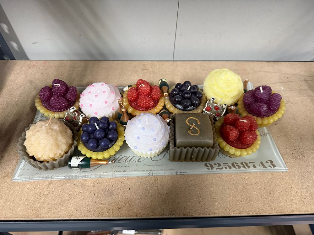 Lot 22: An assortment of novelty figural wax dessert candles on tray