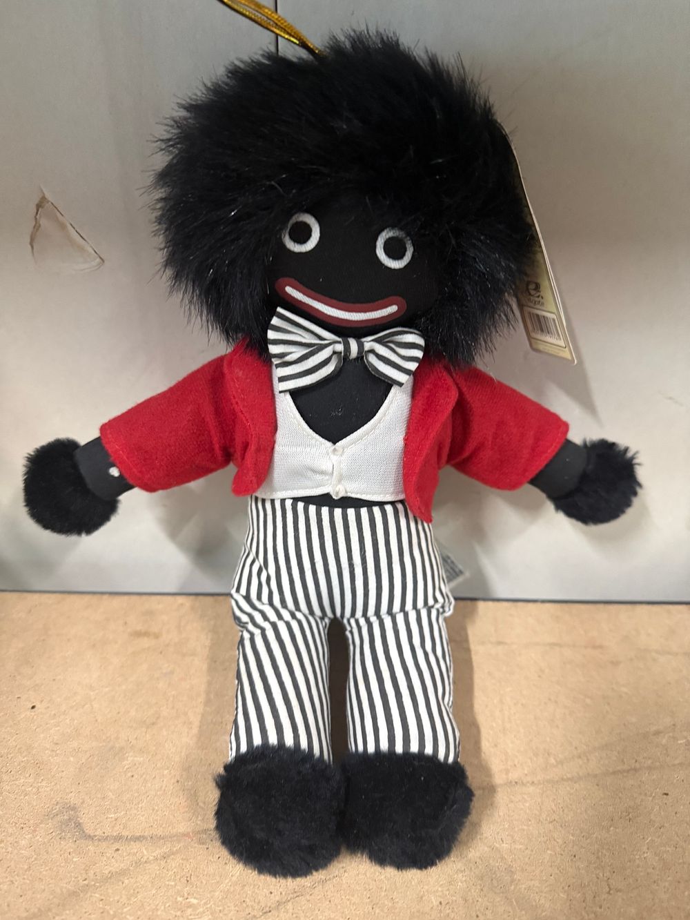 Lot 24: A traditional golly soft toy with original retail hangtag