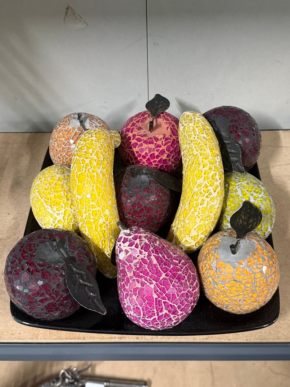 Lot 26: A collection of decorative mosaic glass and resin fruit ornaments in bowl
