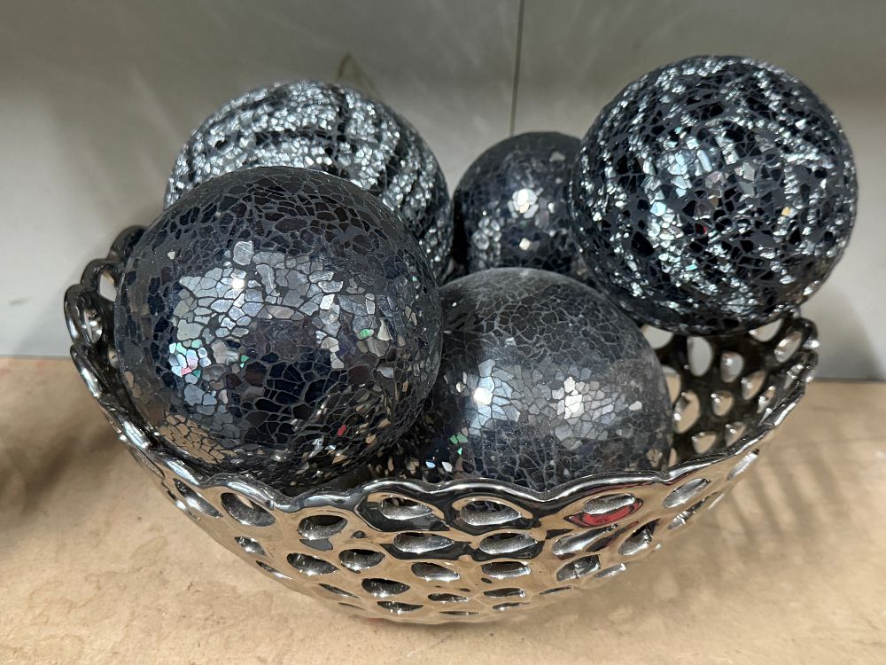 Lot 28: A set of mosaic decorative spheres in a silver-tone openwork bowl