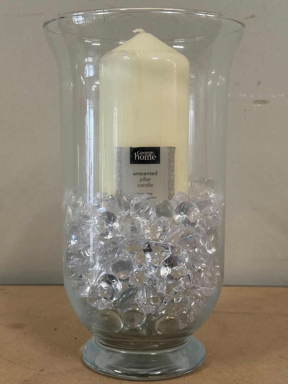 Lot 42: A hurricane vase and unscented pillar candle set