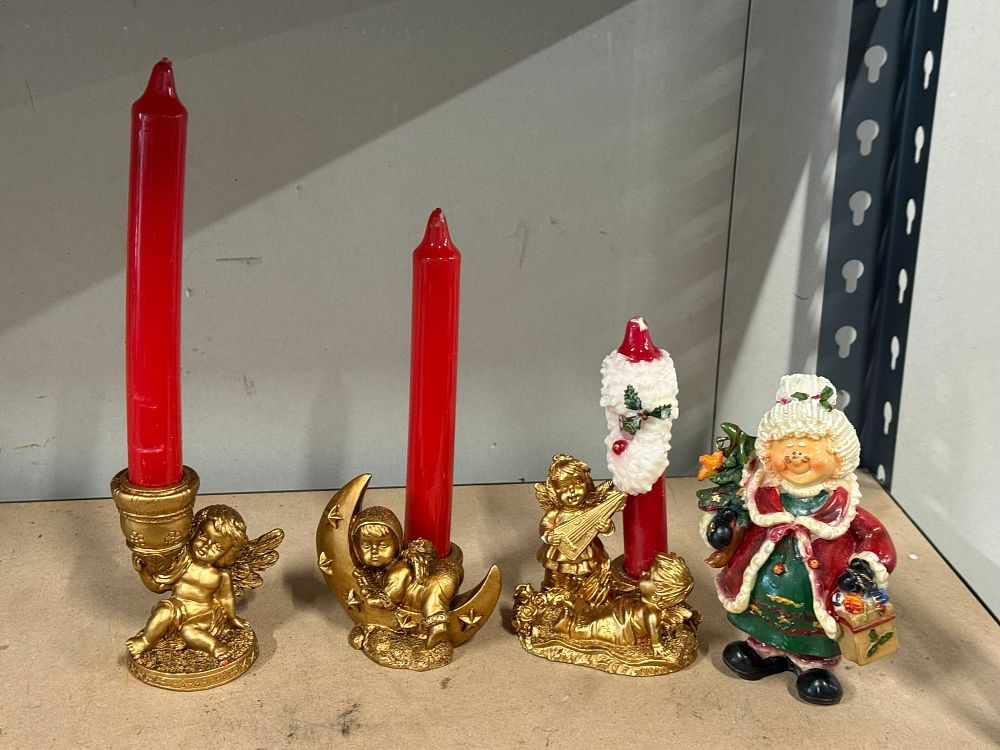 Lot 47: A Collection of Christmas Cherub and Figural Candle Holders