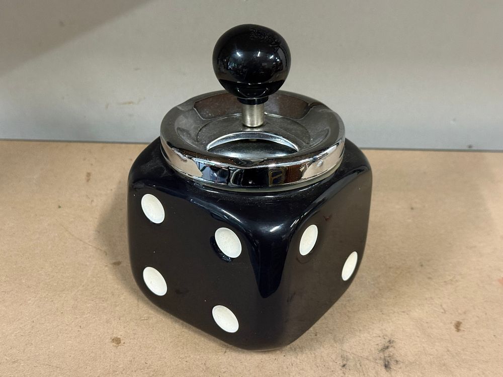 Lot 57: A vintage ceramic and chrome dice novelty spinning ashtray